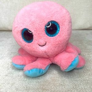 This coral and aqua colored octopus is named Sheldon.
